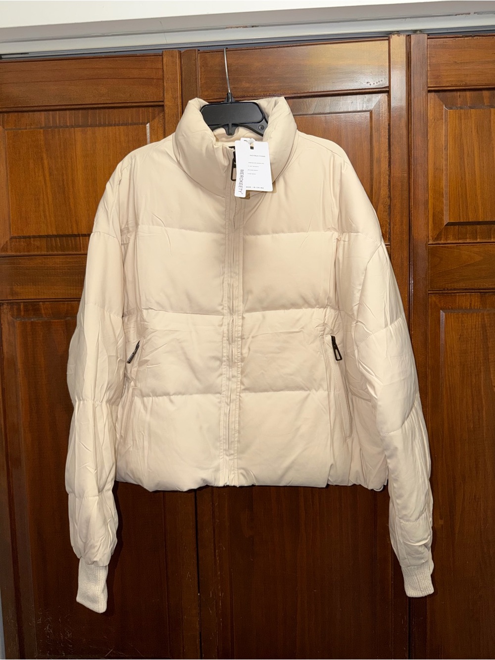 Women's Cream Puffer Jacket with High Collar